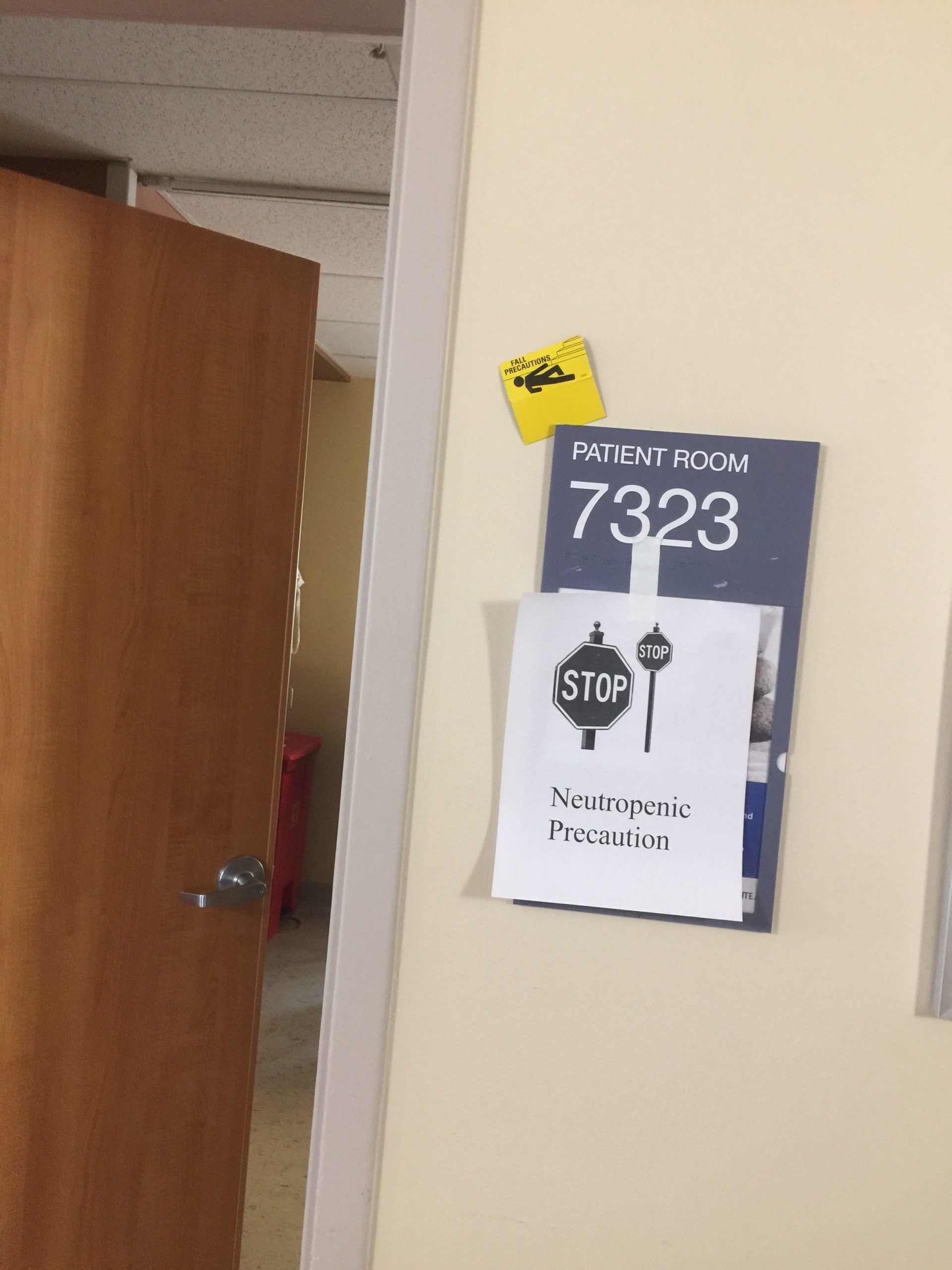 The sign outside my door - neutropenic precaution, visitors need masks